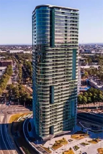 Residents of the Sydney tower that experienced cracks in its concrete have filed legal proceedings against the NSW state government to pay their insurance premium.